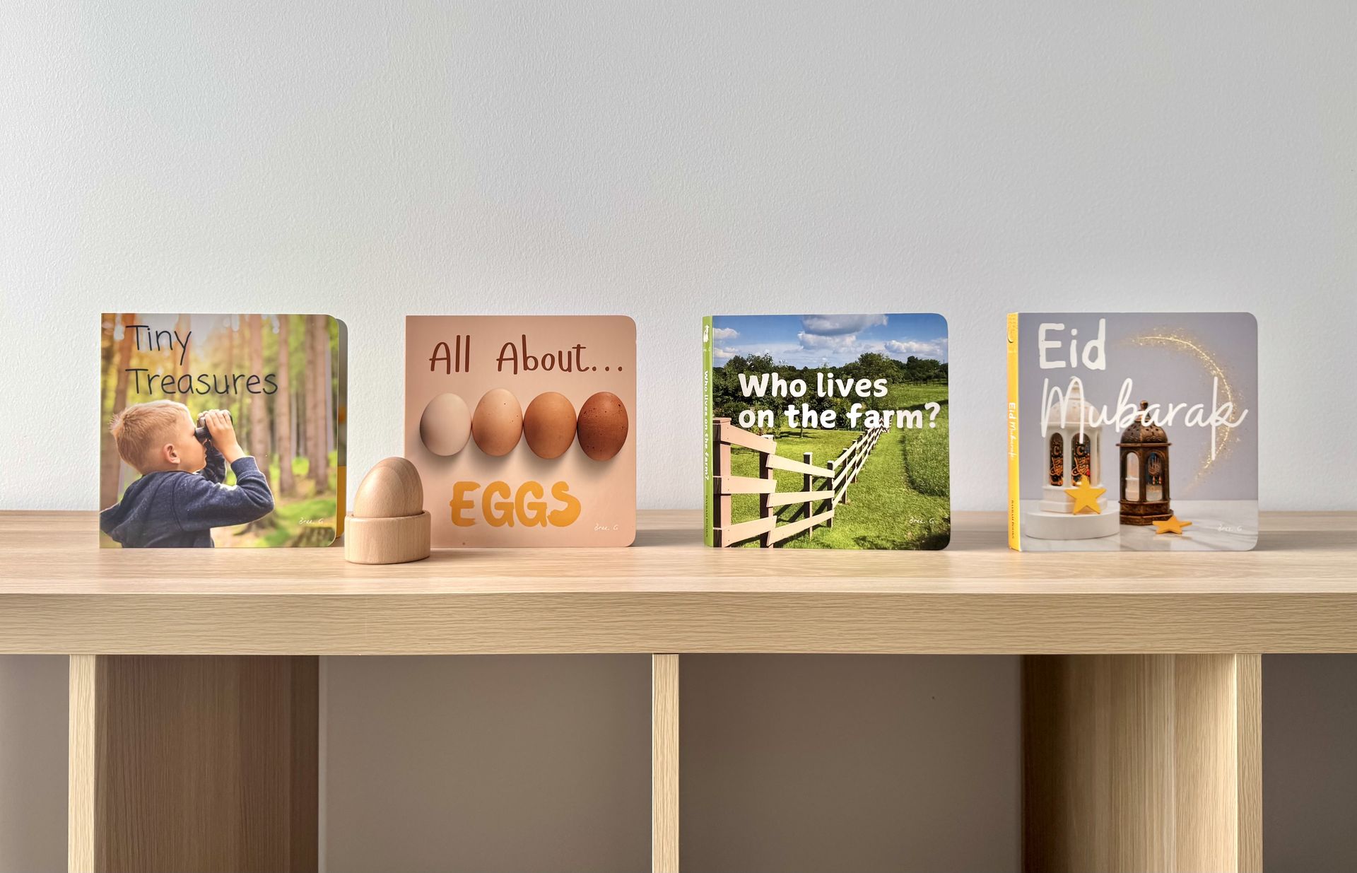 Childrens board books place on a shelf.